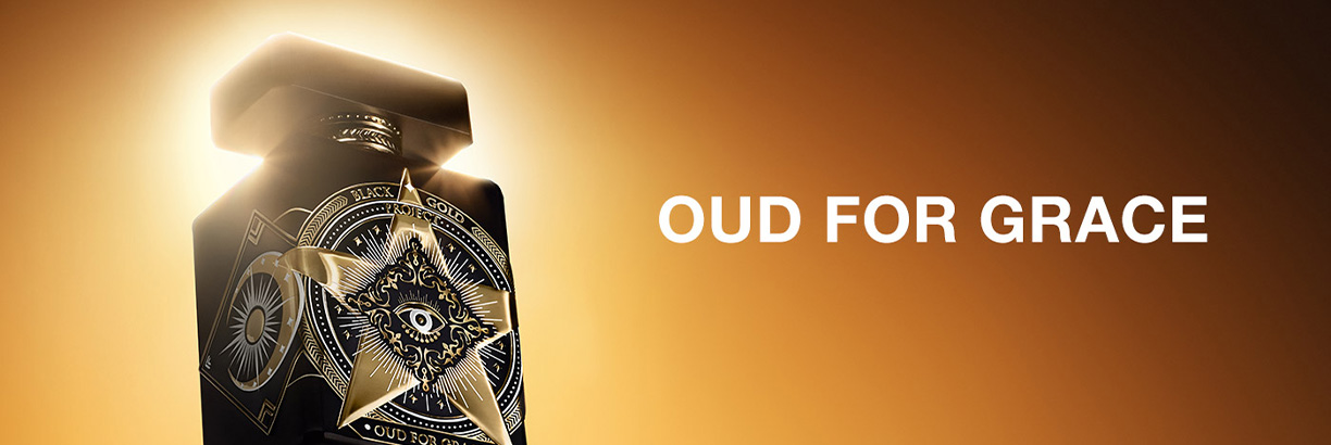 Initio Oud for Grace Eau de Parfum – Flakon mit Stern- und Auge-Motiv, goldenes Licht