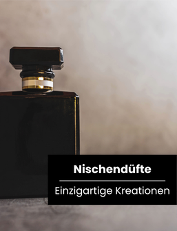 Schwarzer eleganter Parfümflakon mit goldenem Ring vor beigem Hintergrund, Kategoriebild Nischenparfum