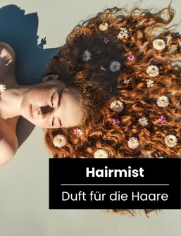 Banner Hairmist – Duft für die Haare, Frau mit lockigen roten Haaren und Blüten im Haar