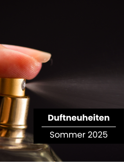 Finger sprüht Parfüm aus goldenem Zerstäuber vor schwarzem Hintergrund, Artikelbild Duftneuheiten Sommer 2025