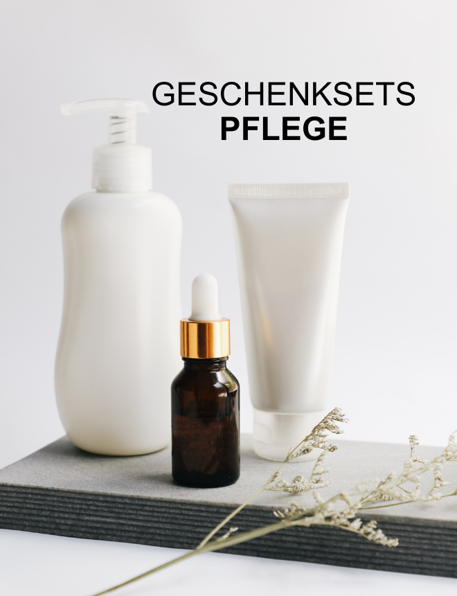 Geschenksets Pflege – Bodylotion, Creme und Serum auf Steinuntergrund